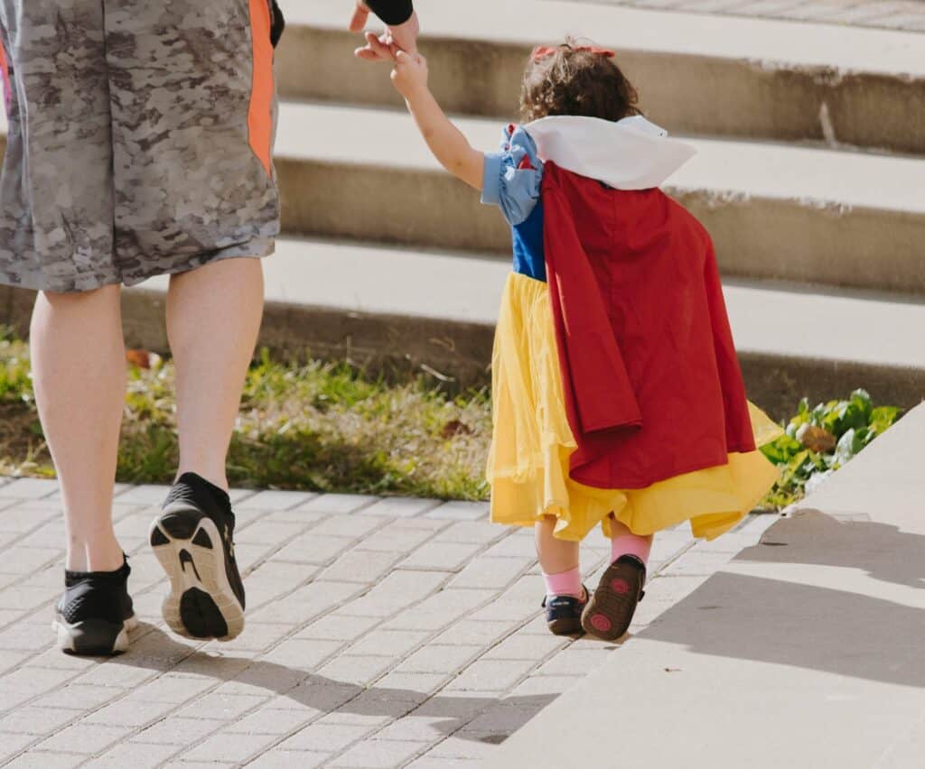 adult and little girl in princess dress