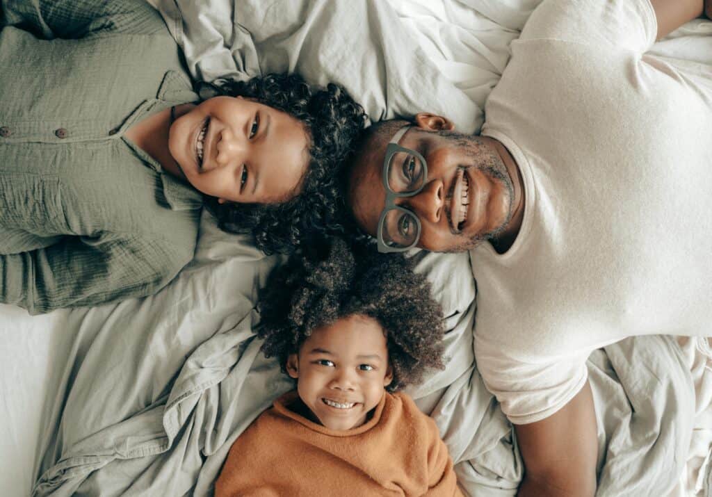 man two kids heads in middle