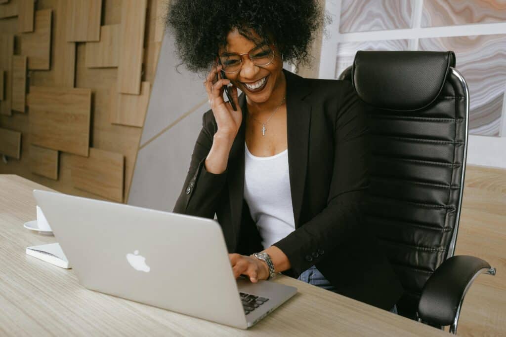 business woman at desk in office on computer