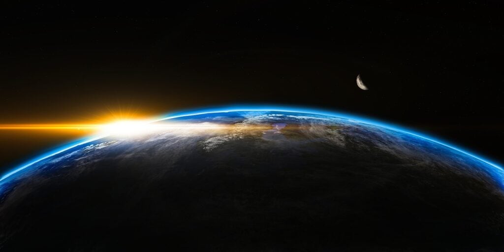 sunrise over earth from space