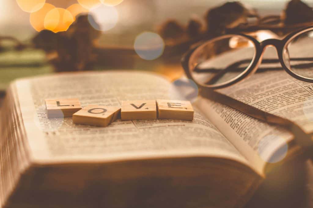 Picture of Bible with the word Love on it showing how Bible verses for Valentine's Day can be found in the Bible