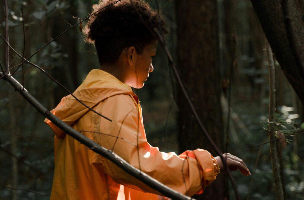 child in dark forest